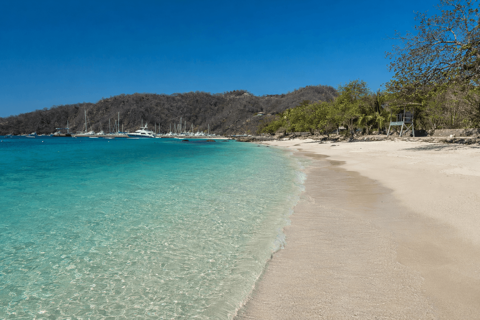 Playa Flamingo with turquoise water and marina, Costa Rica